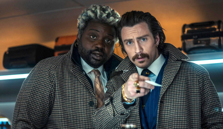 (Brian Tyree Henry and Aaron Taylor-Johnson in Bullet Train)